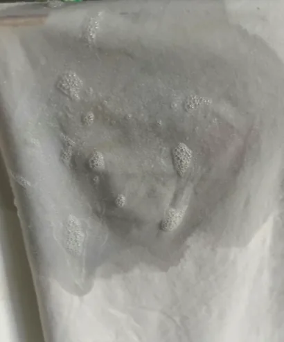 Evolución de la tinta durante el tratamiento y retirada con papel, foto real sin retocar
